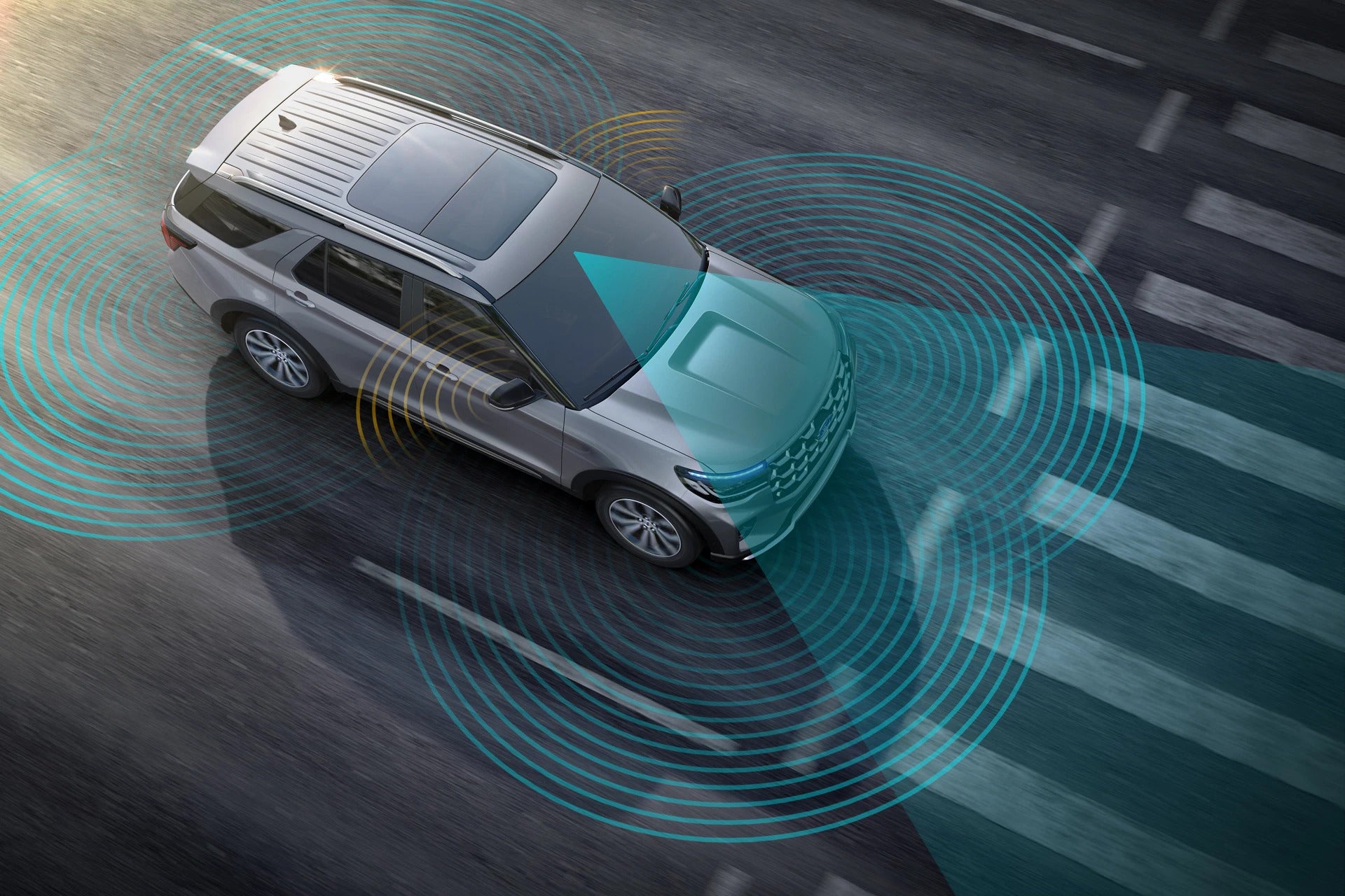 2025 Ford Explorer driving with a visual overlay of the driver-assistance safety technologies.