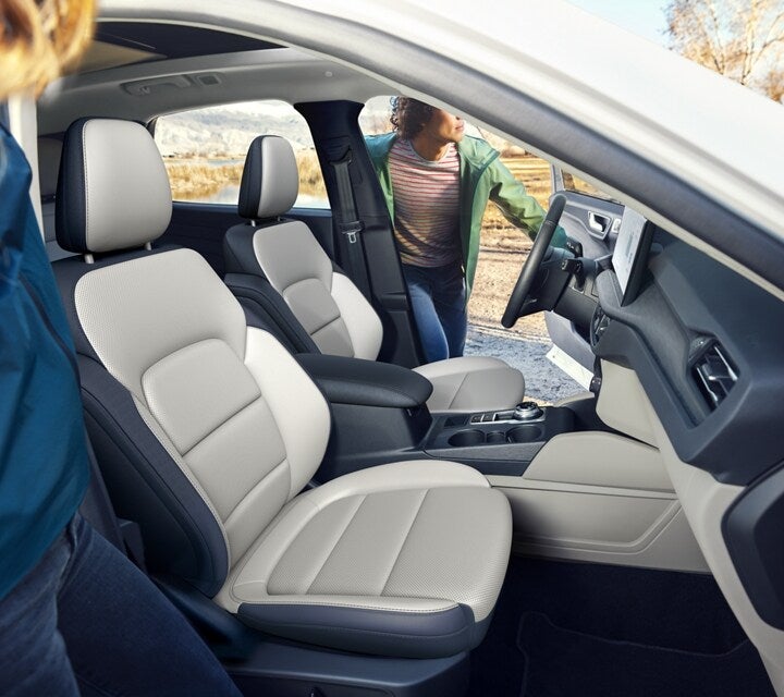 the front interior of a white suv