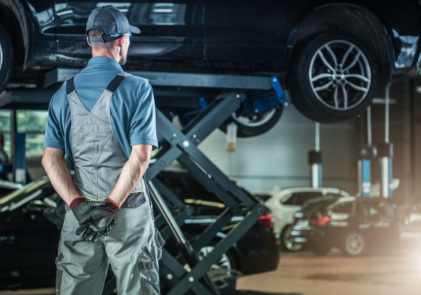 Ford Certified Technician looking over Reliable Ford Service near Owasso OK